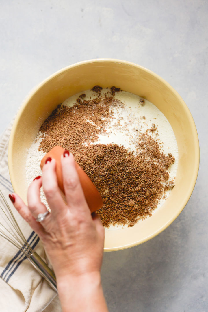 woman making pancakes with flaxseed 