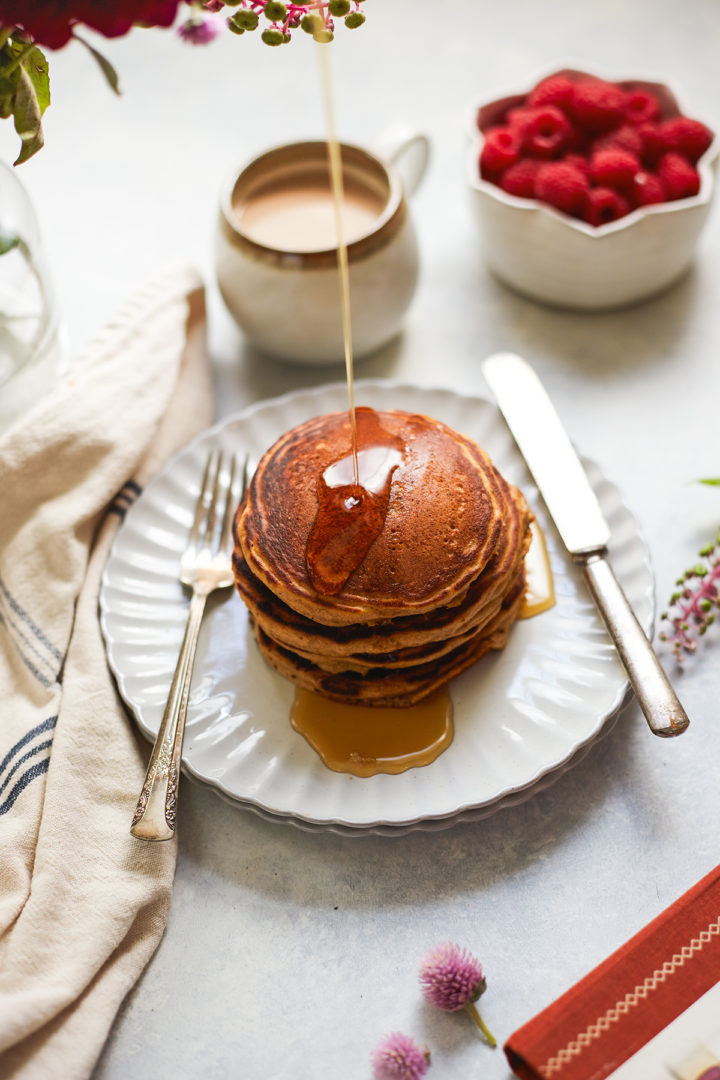 multigrain pancakes stacked on a plate