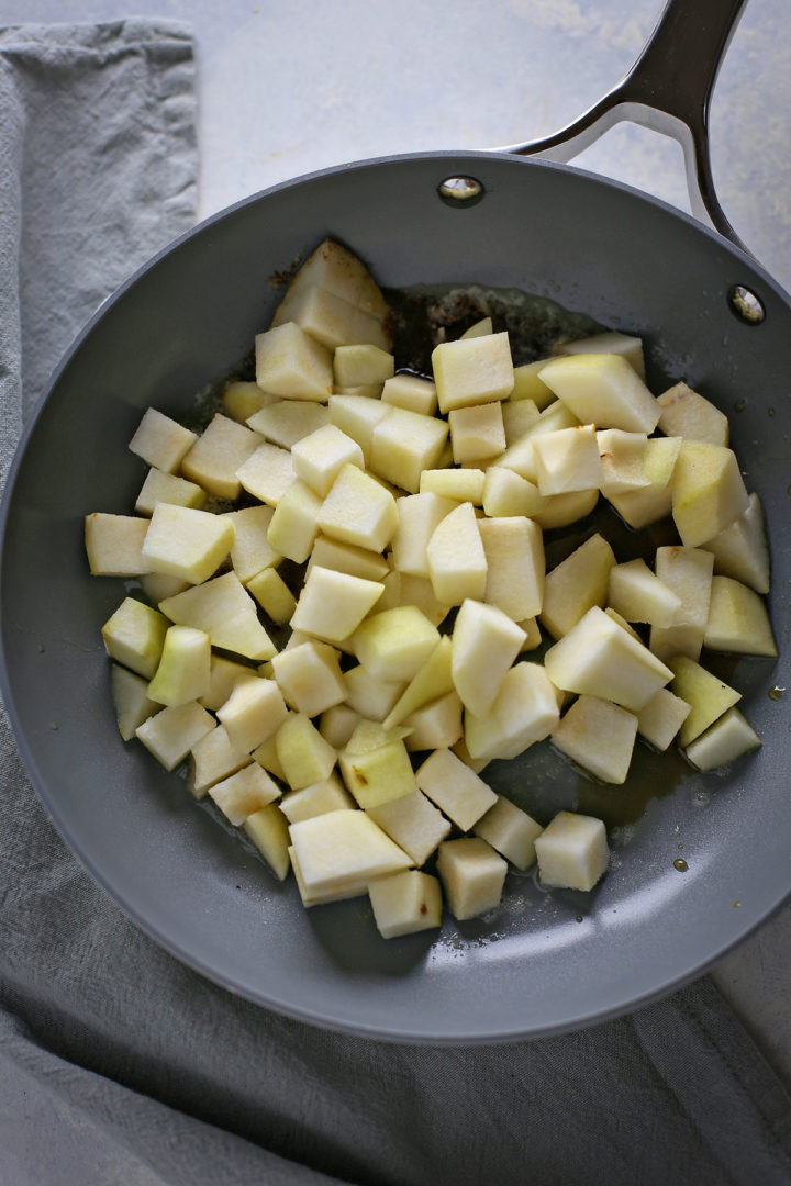 pear compote being made in a pan