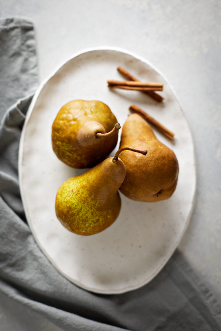 pears on a white plate