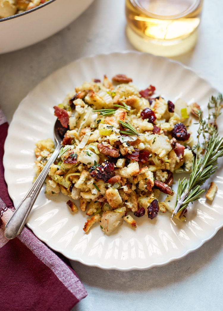 leek stuffing on a white plate with a fork