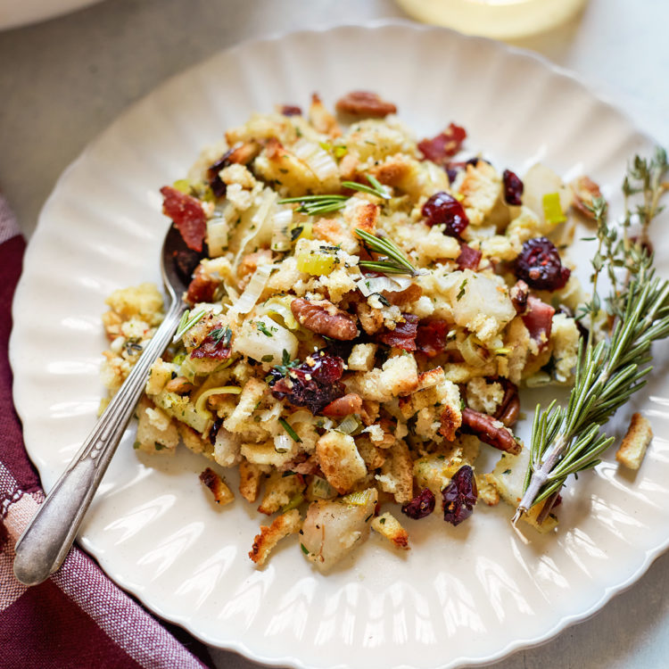 leek stuffing on a white plate with a fork