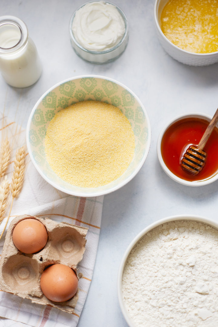 bowls of ingredients for honey cornbread muffins	