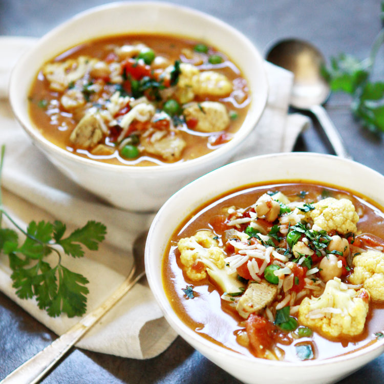 two bowls of curried chickpea soup