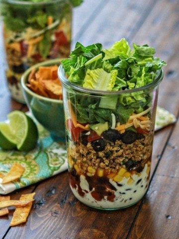 https://www.goodlifeeats.com/wp-content/uploads/2014/04/layered-ground-chicken-taco-salad-in-a-jar-recipe-360x480.jpg