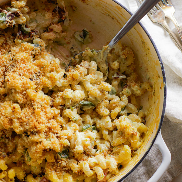 jalapeno bacon mac and cheese in a cast iron baking dish