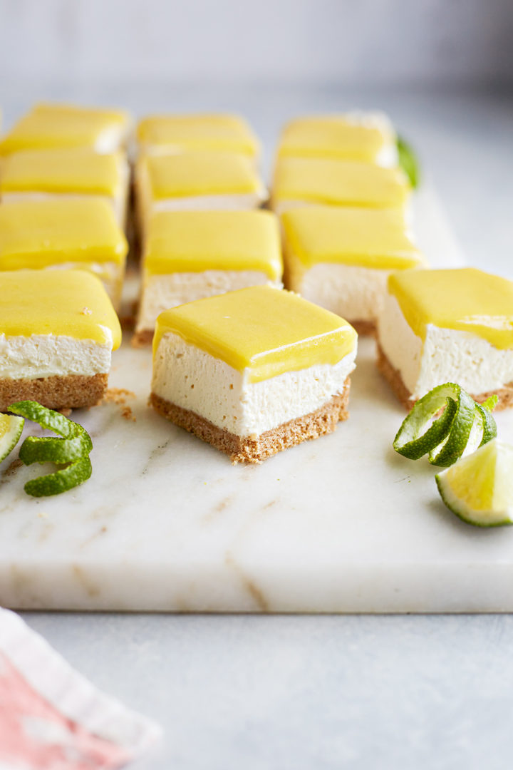 no-bake lime cheesecake bars made with juice from a lime