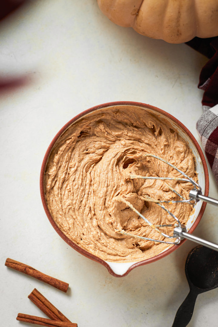 a bowl of pumpkin cream cheese filling