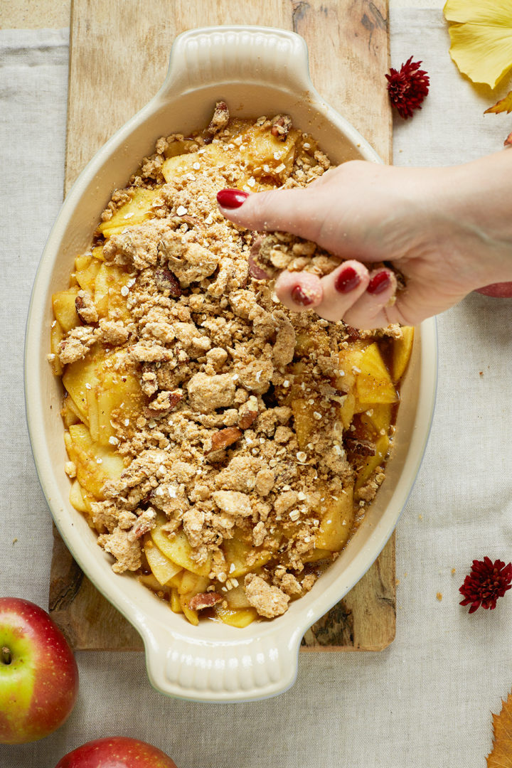 apple crisp with bourbon in a baking dish