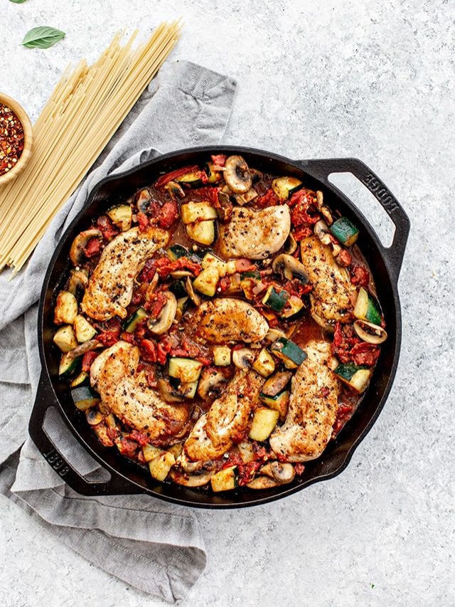 cast iron skillet with chicken