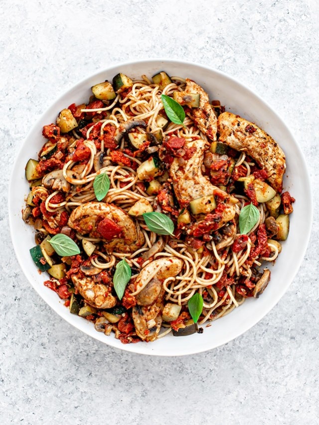 large white bowl with chicken and pasta