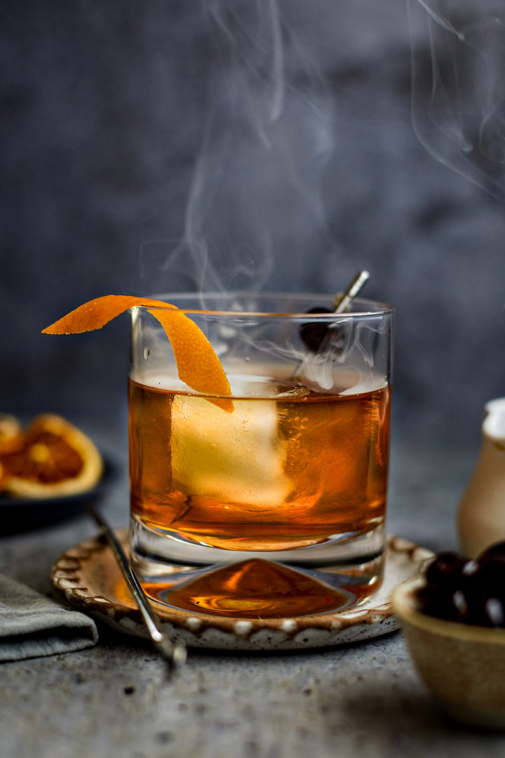 glass of smoking old fashioned