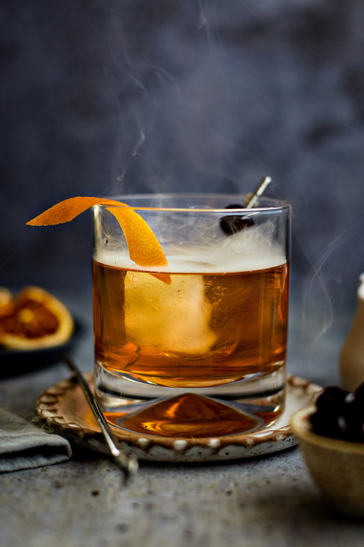 smoking old fashioned in a glass