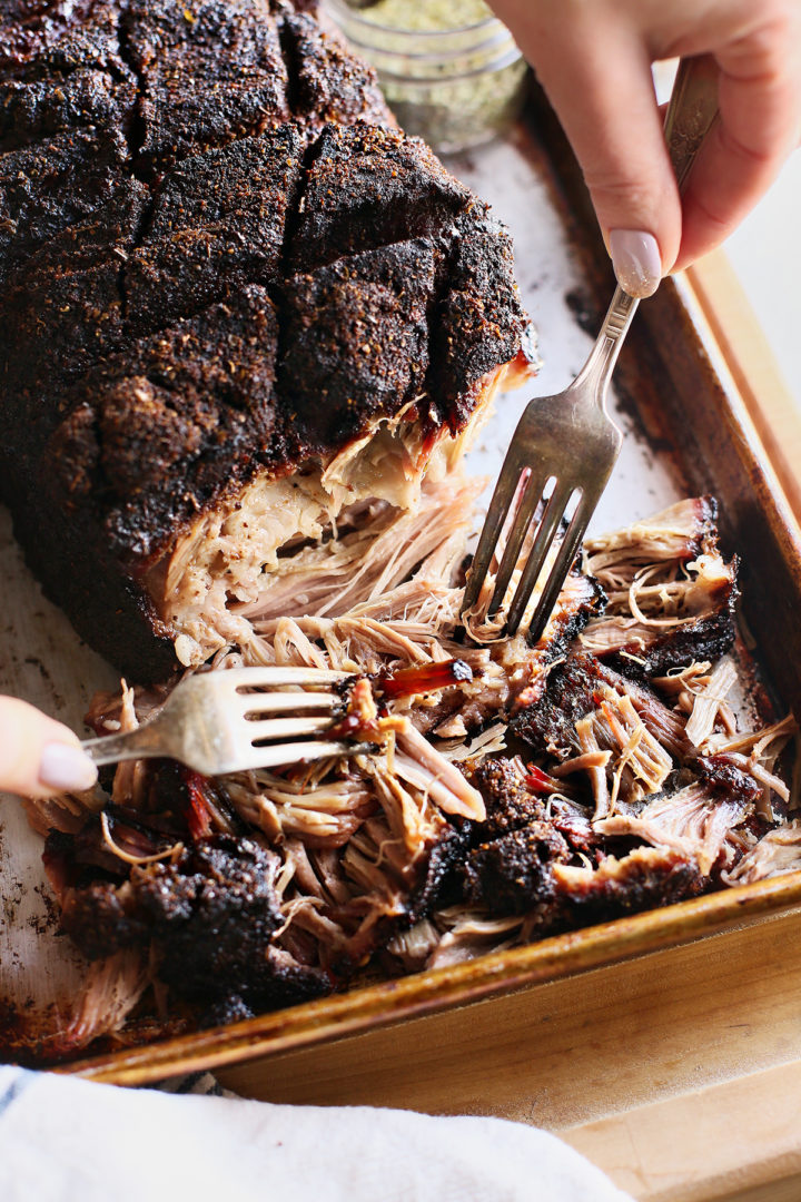 woman shredding traeger pulled pork