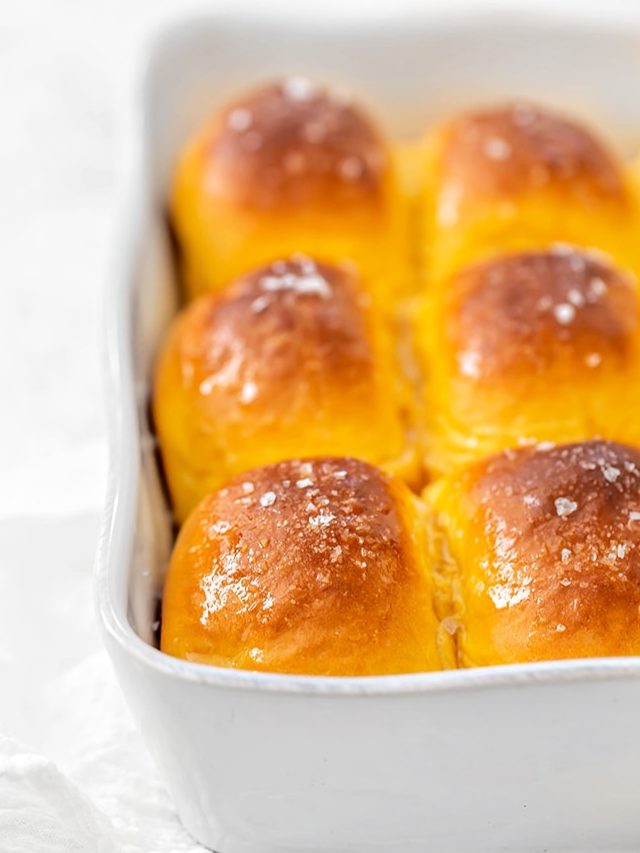 sweet potato dinner rolls in a white baking dish