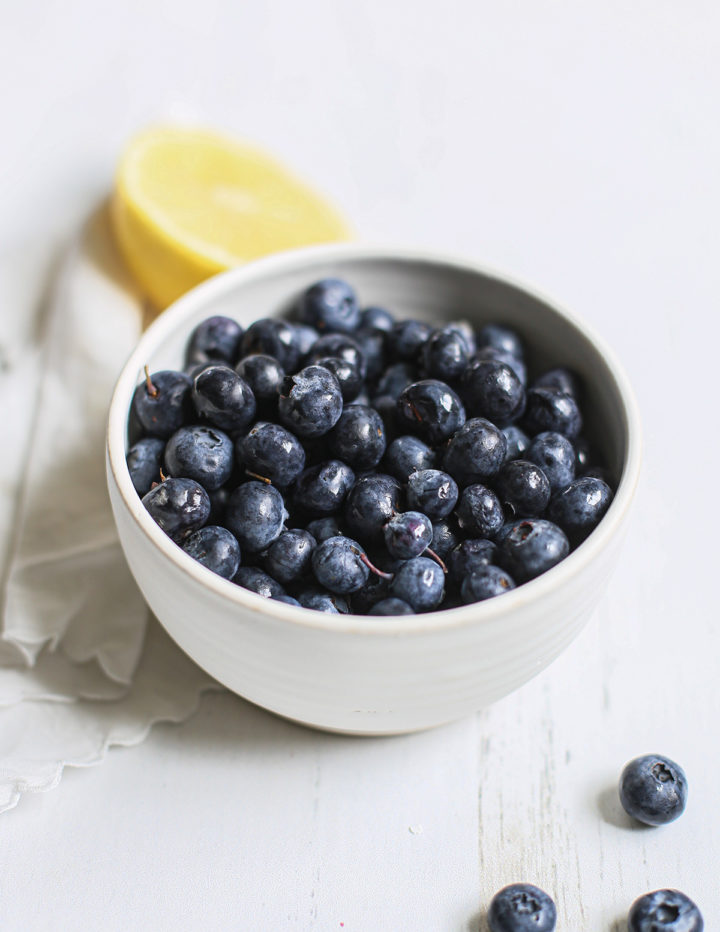 a bowl of fresh blueberries ready to be frozen