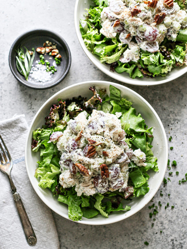 photo of tarragon chicken salad on a bed of greens