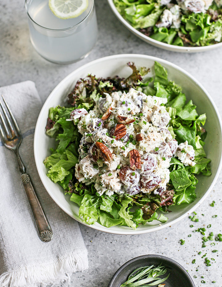 photo of tarragon chicken salad in a bowl with a fork