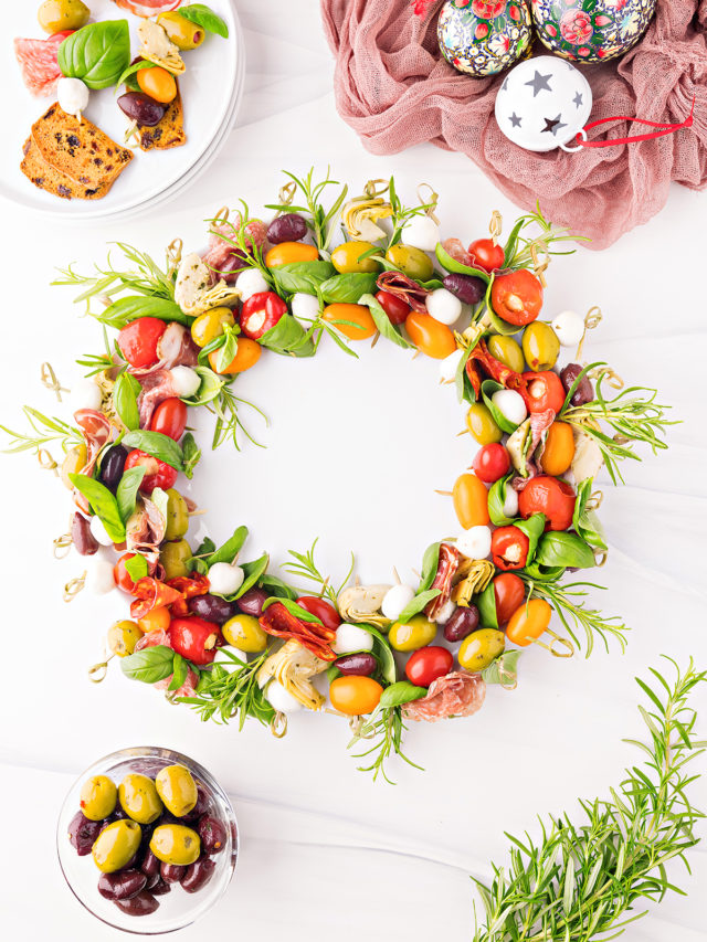 overhead photo of an antipasto wreath made from antipasto skewers