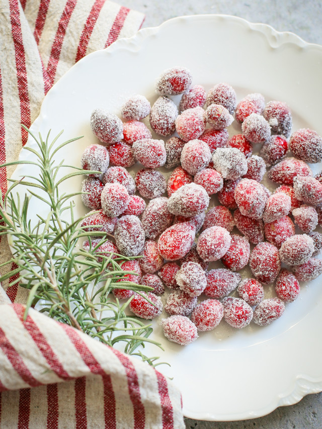 sugared cranberries on a white plate