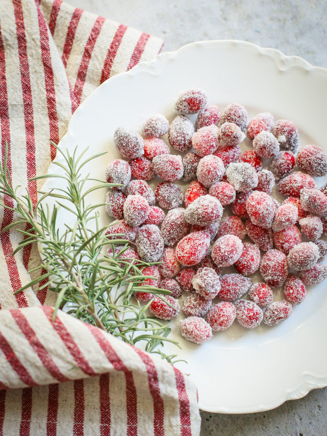 sugared cranberries on a white plate