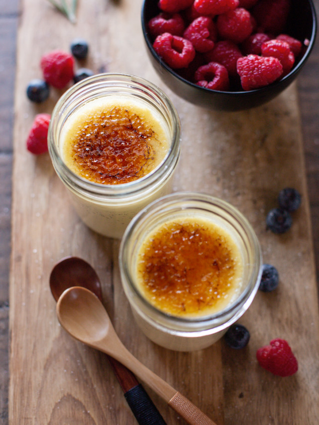 photo of 2 jars of sous vide creme brulee with fresh berries