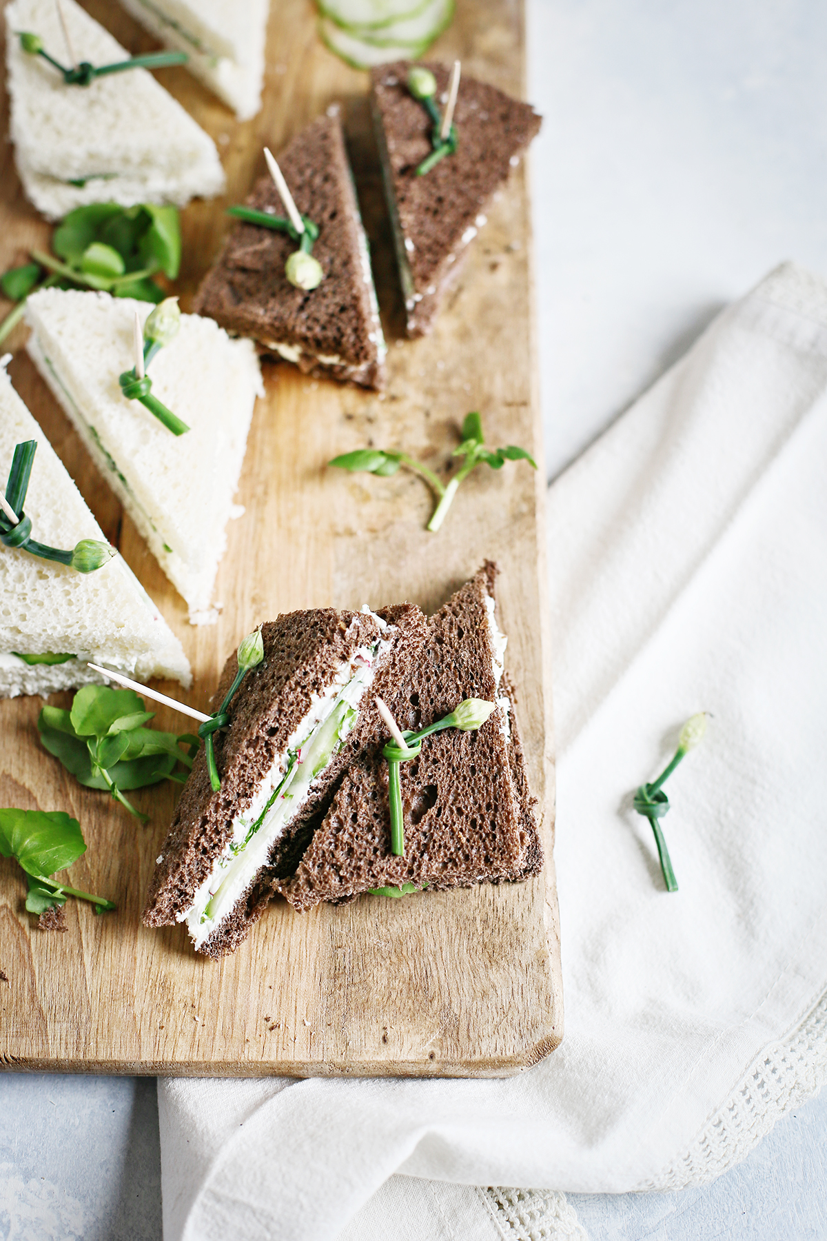 https://www.goodlifeeats.com/wp-content/uploads/2023/04/Watercress-and-Cucumber-Tea-Sandwiches-1.jpg