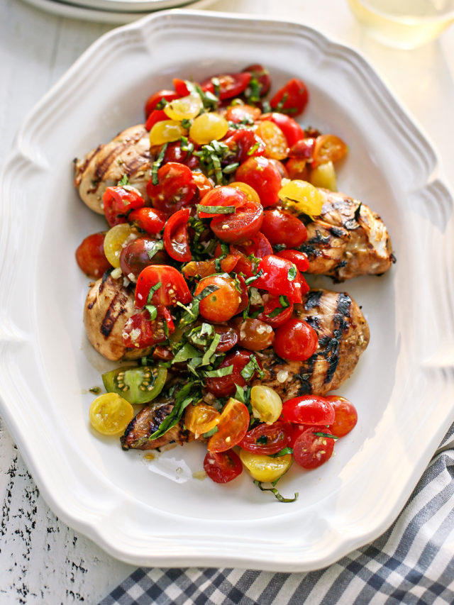 bruschetta chicken on a white platter