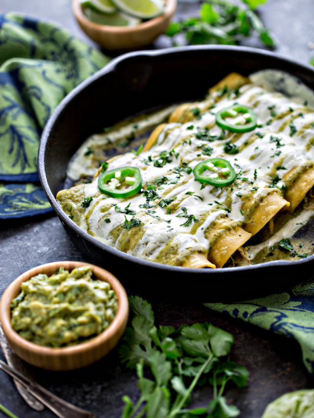 cast iron pan with salsa verde enchiladas