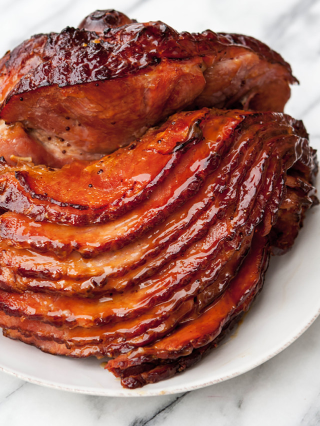 slow cooker ham on a white serving plate