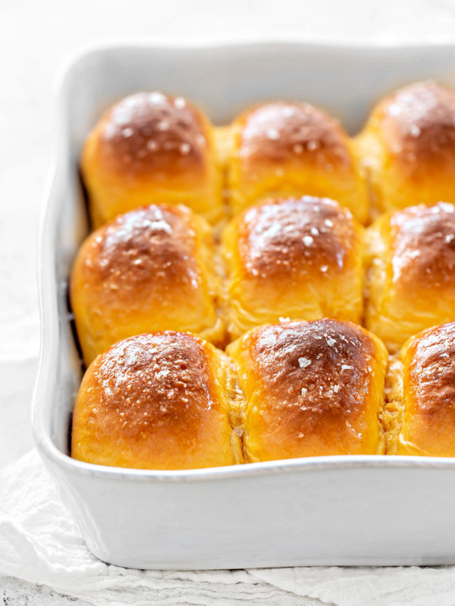 sweet potato rolls in a white baking pan