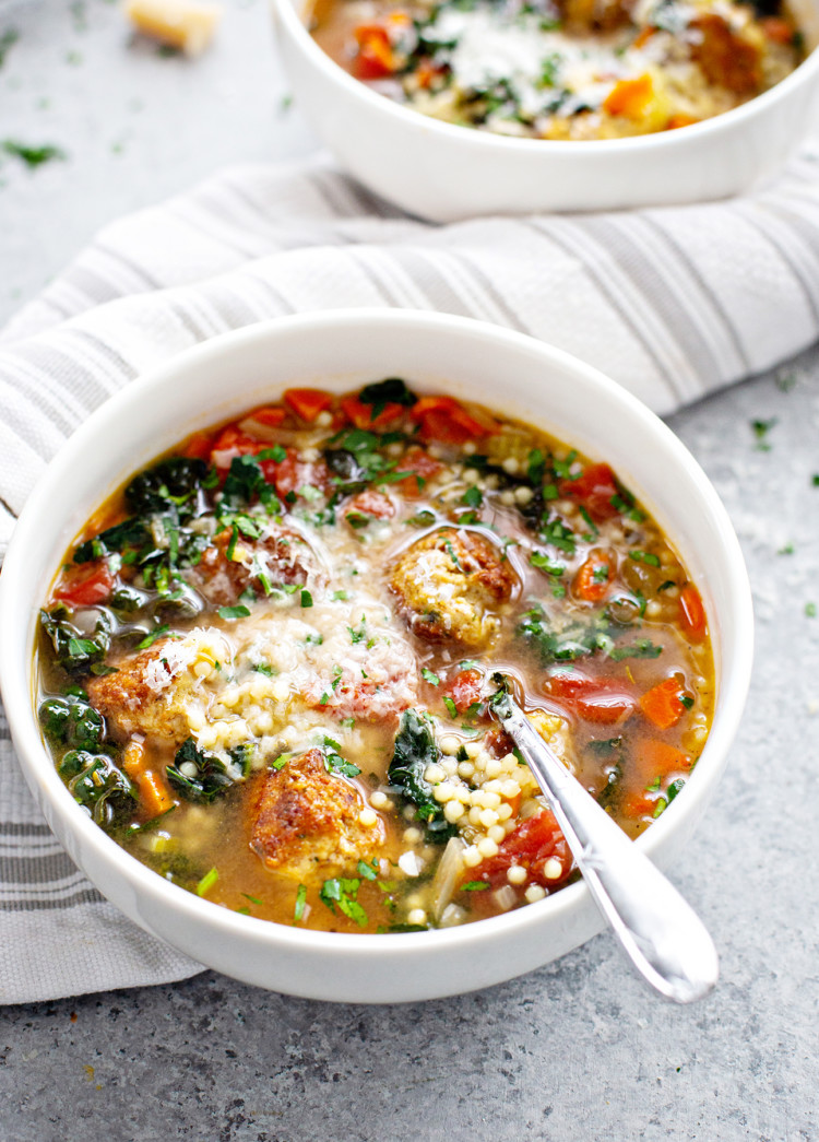 bowl of italian wedding soup with chicken meatballs