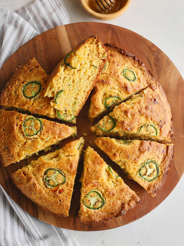 overhead photo of sliced cornbread with jalapenos