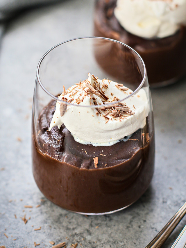 homemade chocolate pudding in glasses with whipped cream garnish