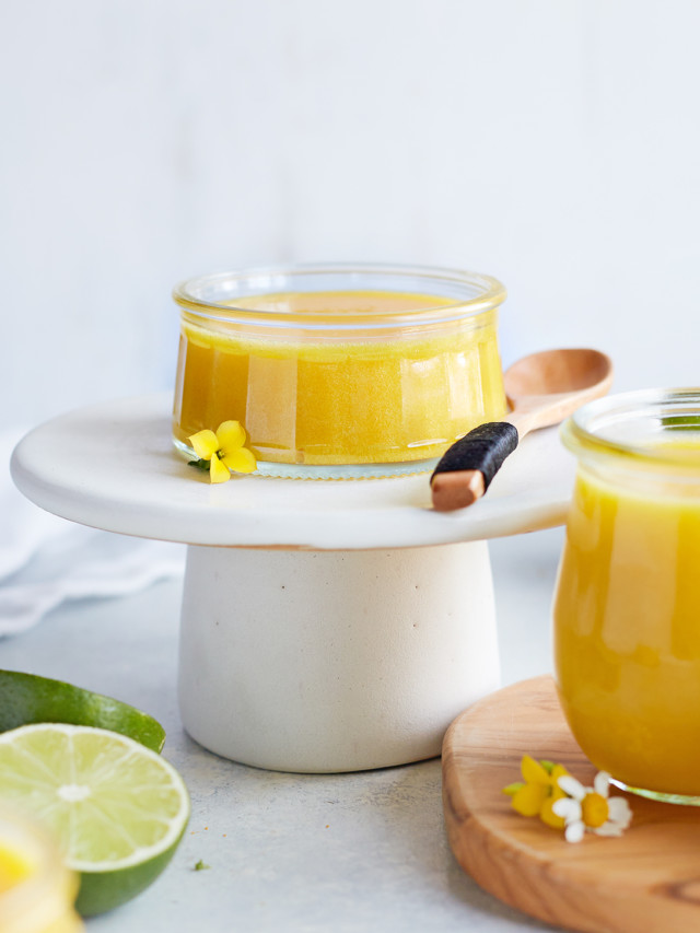 jar of lime curd on a white serving platter