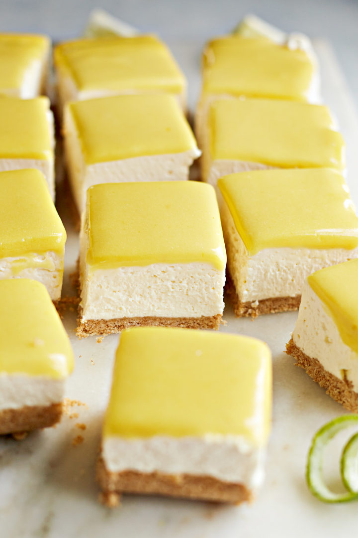 lime cheesecake bars on a marble board