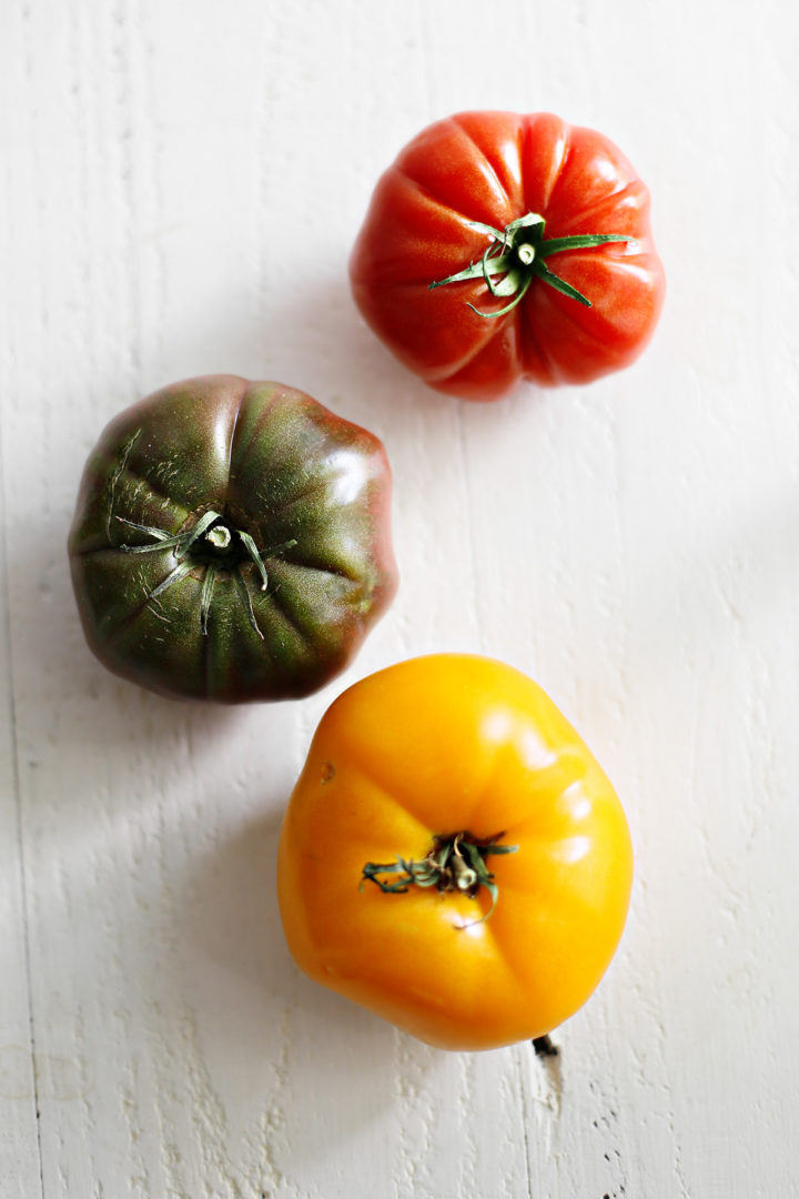 tomatoes on a white wooden table