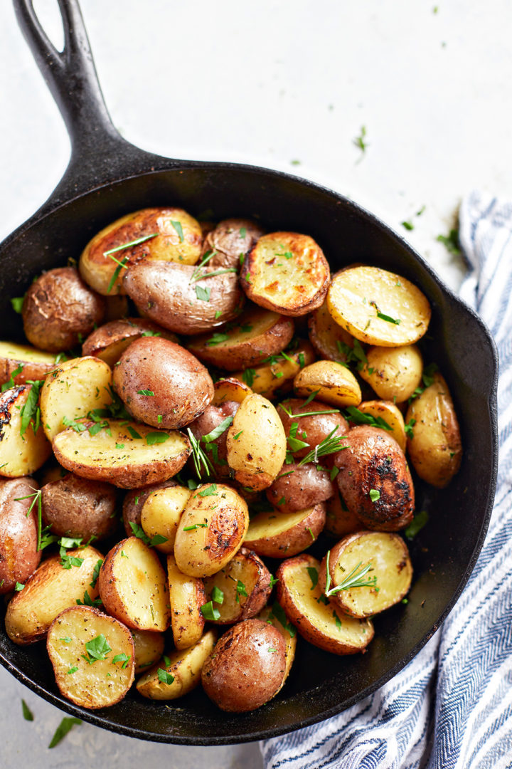 traeger roasted potatoes in a cast iron pan