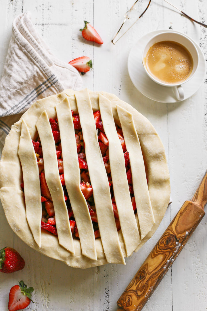 step 1 showing how to make a lattice crust top for a strawberry rhubarb pie