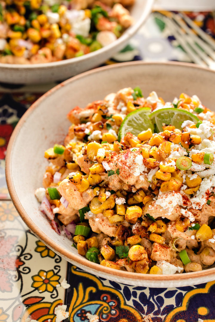 serving bowl of mexican corn pasta salad