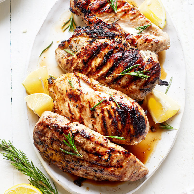 platter of grilled lemon rosemary chicken