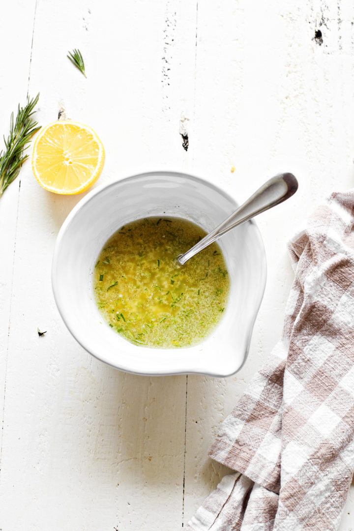 a bowl of lemon rosemary marinade for chicken