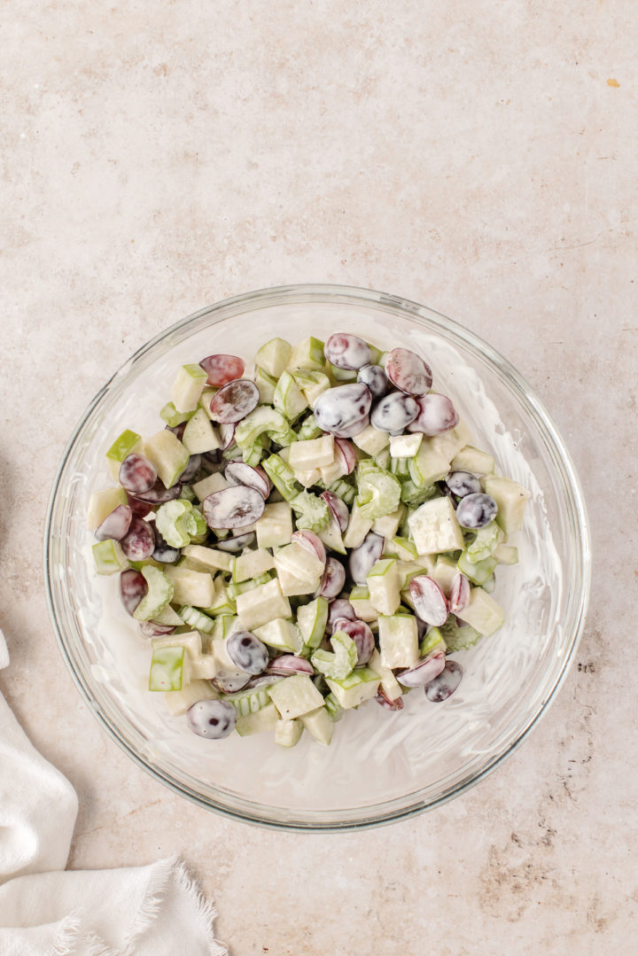 Waldorf apple salad coated in Waldorf salad dressing

