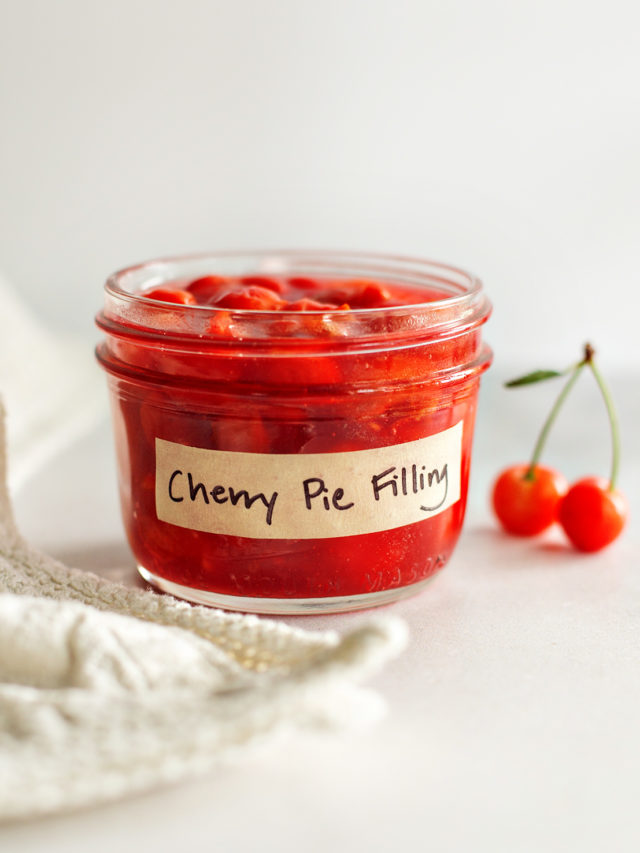 a jar of homemade cherry pie filling