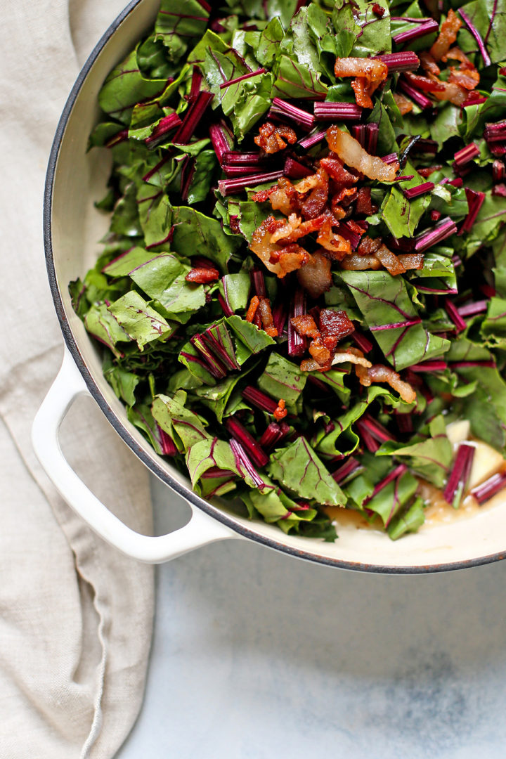 beet greens cooking with bacon