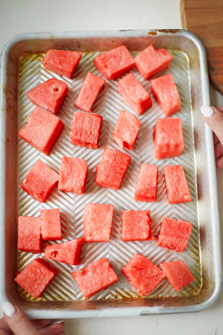 woman showing how to freeze watermelon