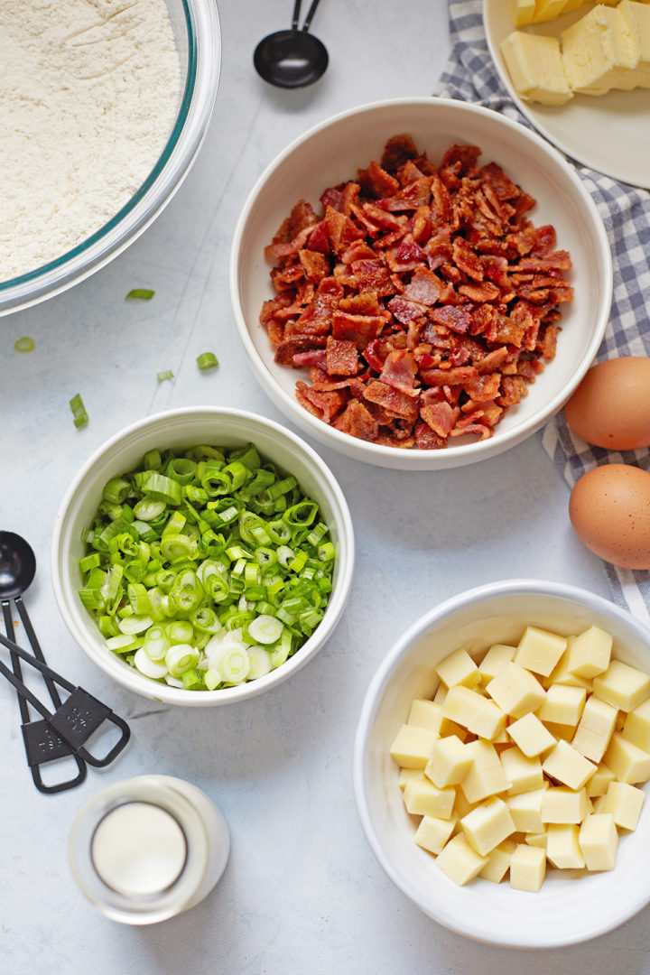 bowls of bacon, cheese, and green onions for bacon cheese scones