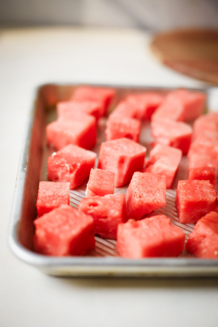 a tray of frozen watermelon cubes