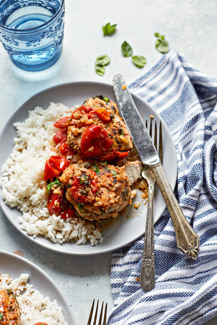 chicken with herbs de provence on a plate with rice