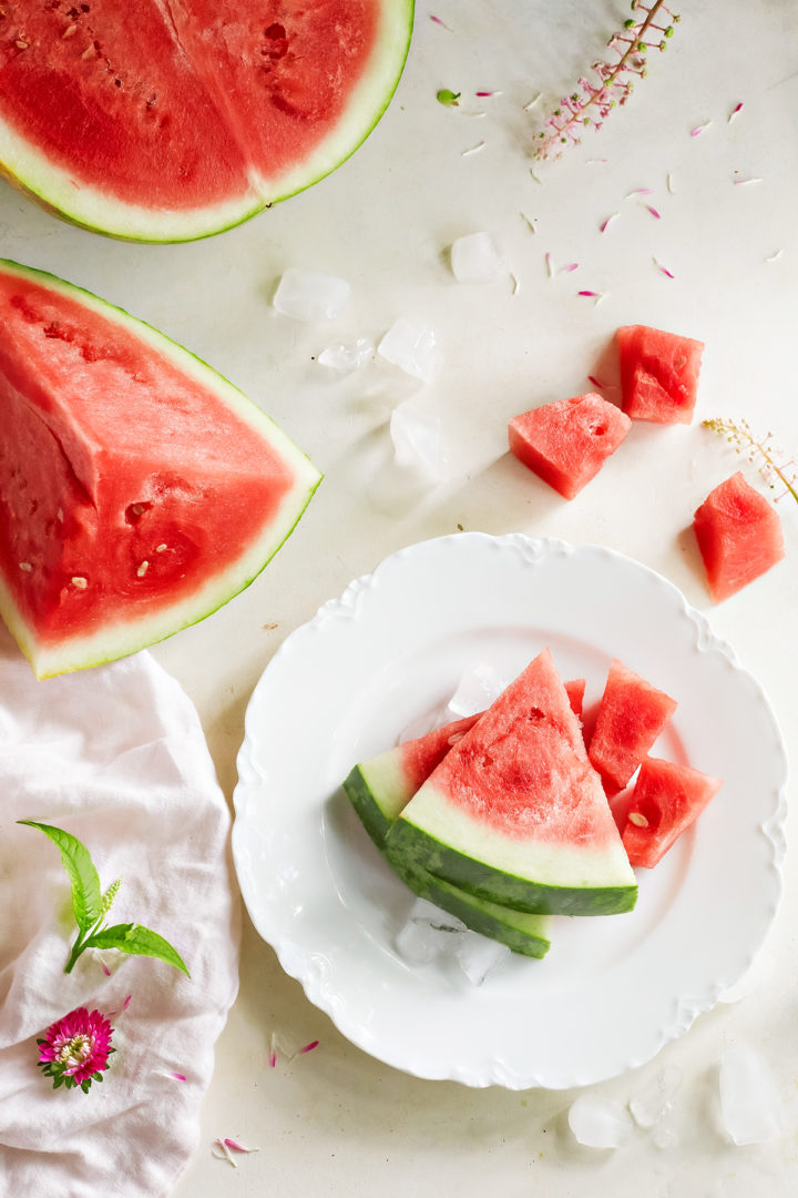 sliced watermelon on a white plate